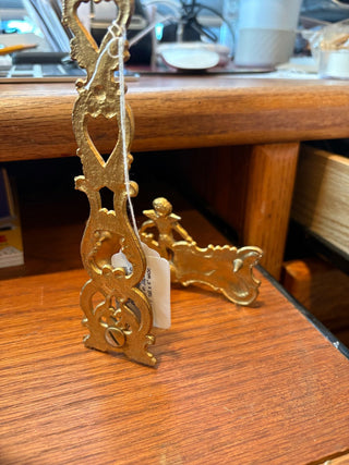 Vtg. Brass easel, ornate w/cherub design, made in Japan, 6.75" x4"