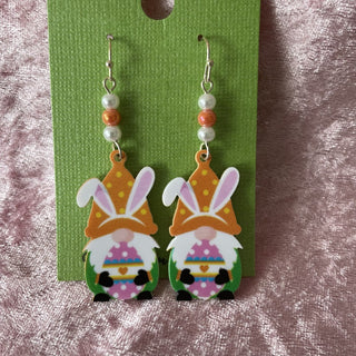 Easter gnome holding pink egg earrings RSV