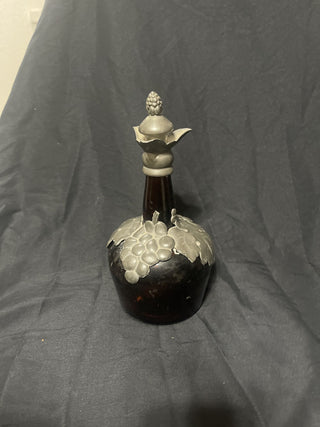 Amber bottle with pewter grapes rsv