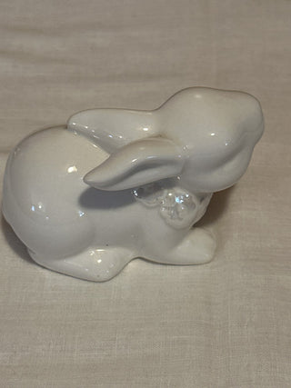 White ceramic bunny with floral neck wreath. #SM|51790