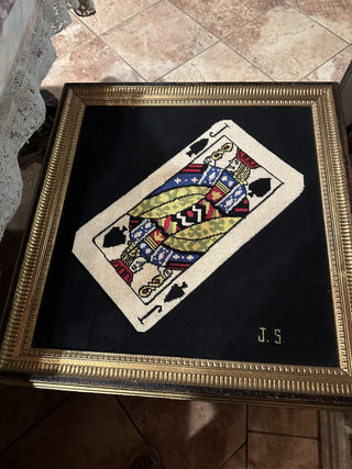 Framed embroidery piece featuring Jack of Spades playing card #62 VV MTS