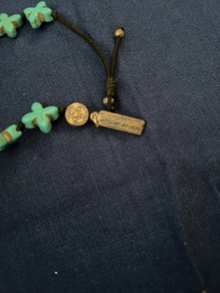 Turquoise  Saints bracelet w/ “faith” charm