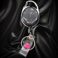 Carabiner with Belt Clip Interchangeable Badge Reel with Retractable Reel. Badge Button: Pink Cheetah. Our Interchangeable Badge Reels are made to be used with our Interchangeable Badge Reel Charms.|63912