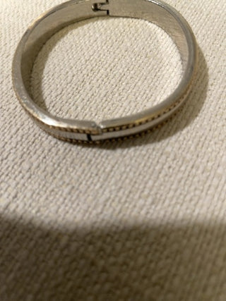 Silvertone with gold band clasp bangle bracelet