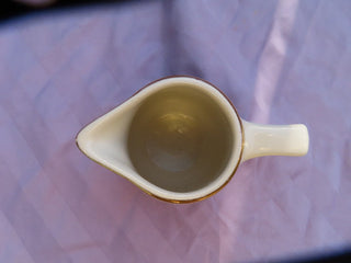 Creamer with gold rim Made in USA  MTS