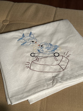 Embroidered towel with bluebirds ironing. #SM. RCD|51080