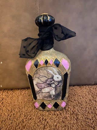 White rabbit and clock glass bottle