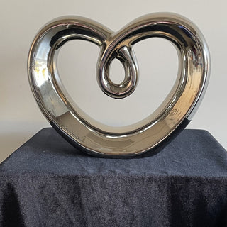 silver metal sculpture, heart shape RSV