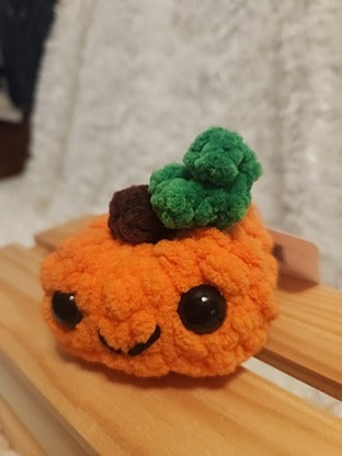Medium Happy Pumpkin: Crocheted. Orange, brown, green, black