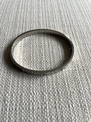 Silvertone bangle bracelet with clear crystals