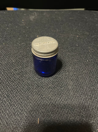 cobalt blue bottle with metal lid