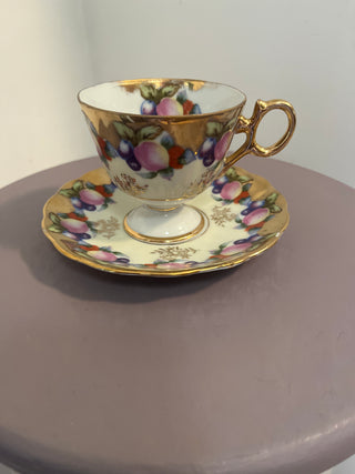 Porcelain fruit cup and saucer