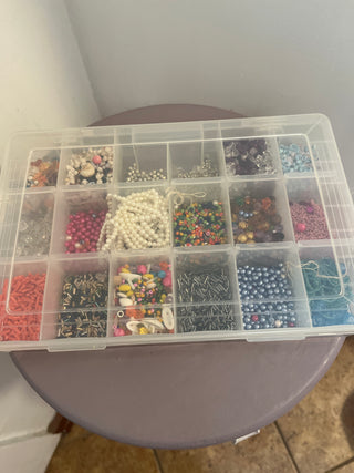 Misc. beads sorted in storage bin