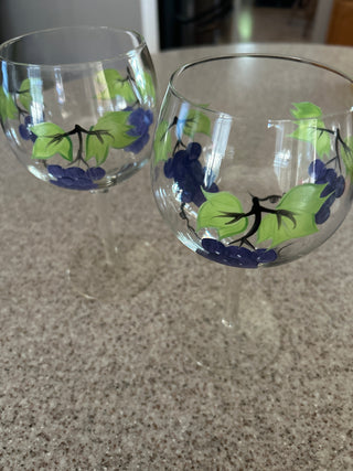 Clear glass wine goblet w/ hand painted grape and leaf design