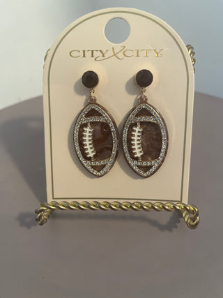 Dangling football earrings with bling