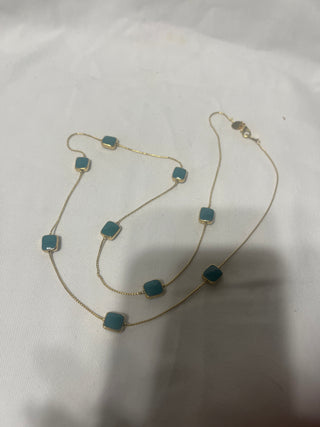 Long gold and green necklace