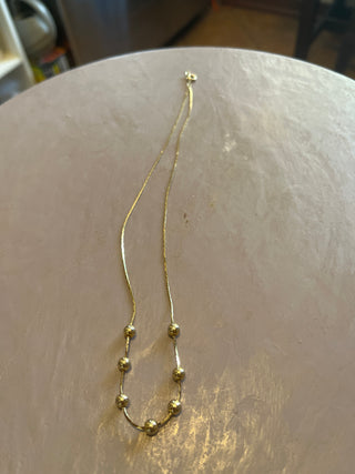 Gold tone necklace