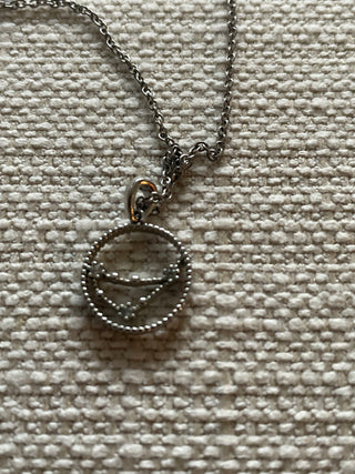 Silver tone zodiac necklace