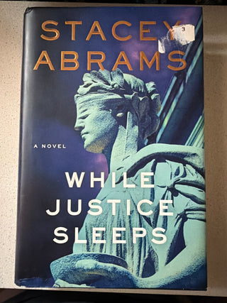 While Justice Sleeps Hardcover
