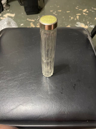 cosmetic jar with green lid