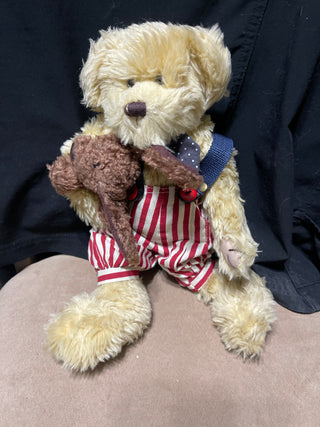 stuffed animal dressed in Fourth of July overalls