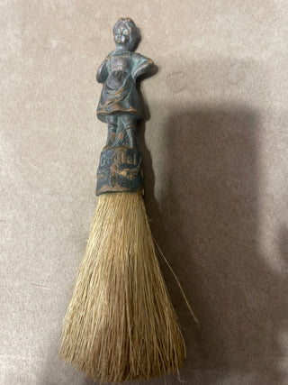 large whisk  broom Gretel