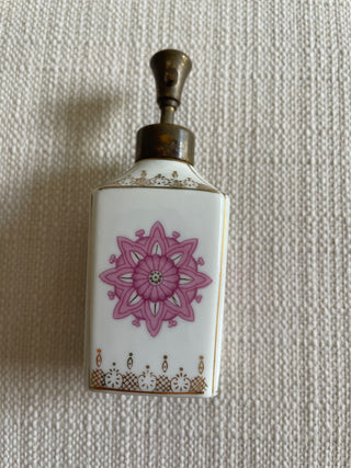 Vintage perfume bottle, pink and gold design