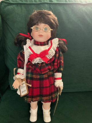 Porcelain school girl doll