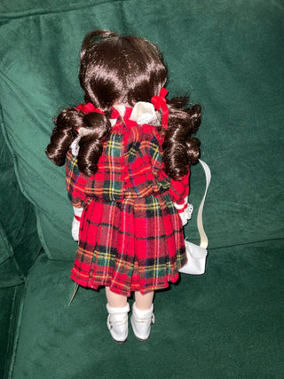 Porcelain school girl doll