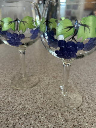 Clear glass wine goblet w/ hand painted grape and leaf design