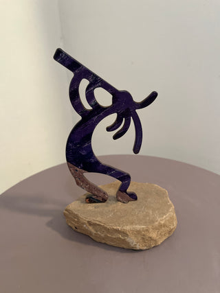 Kokopelli dancing flute