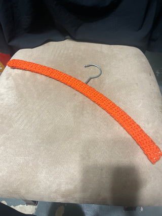 Orange crocheted hanger rsv