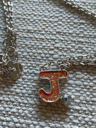 Disney J Silvertone necklace