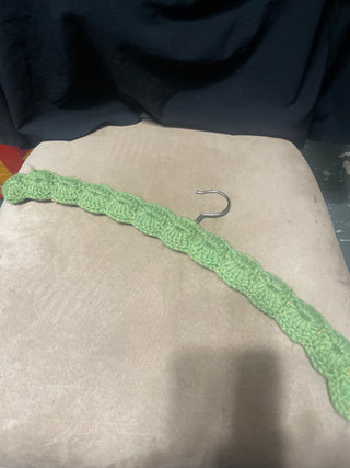 Green crocheted hanger rsv