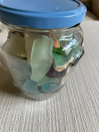 Jar of Sea Glass and sea pottery