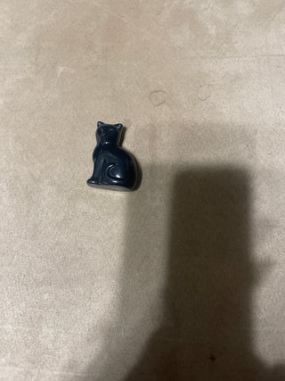 Black plastic cat