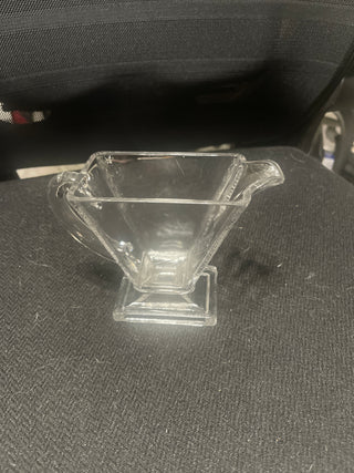 Glass creamer chip on base