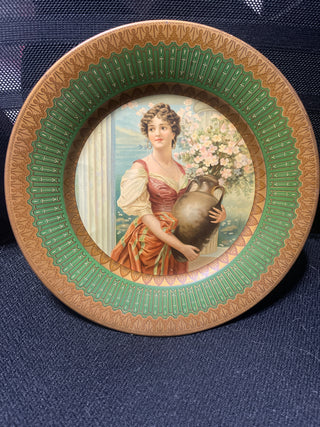 Tin plate green and gold woman holding pitcher