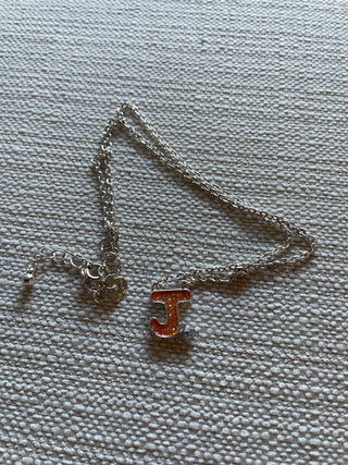 Disney J Silvertone necklace