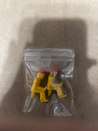 two cowboy figurines
